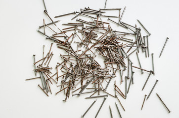 pile of iron nail on white background