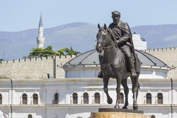 Fototapeta premium Square Makedonia, the capital's main square, with people passing by and Alexander the Great statue