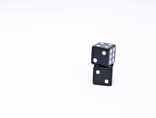 two black dice on a white background