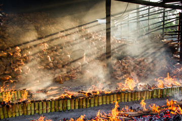 Incineration plant burns rice roasted in bamboo. sticky rice soa