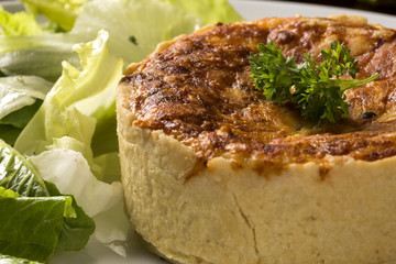 tasty quiche with salad