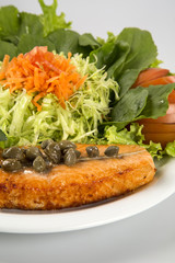 Grilled salmon steak and vegetables