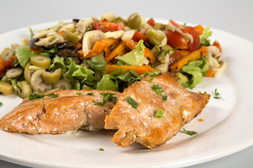 Grilled salmon steak and vegetables