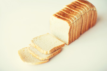 Fototapeta na wymiar close up of white sliced toast bread on table