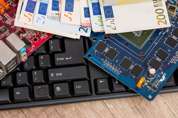 Laptop Keyboard and Euro Bills