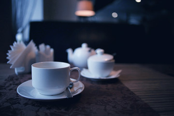 teapot and cup of tea at a cafe