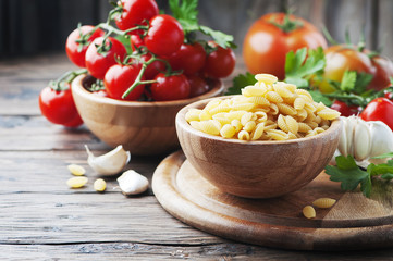 Sardinian uncooked pasta on the wooden table