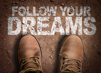 Top View of Boot on the trail with the text: Follow Your Dreams