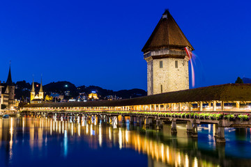 Fototapeta na wymiar LUCERNE, SWITZERLAND - AUGUST 2: Views of the famous bridge Kape