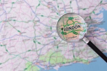 Consultation with magnifying glass map of London