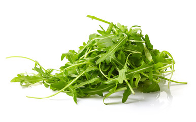 Fresh green arugula on white background