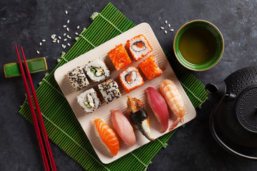 Set of sushi, maki and green tea