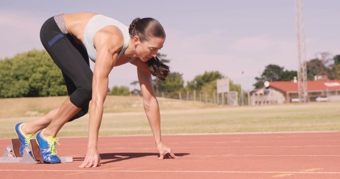 Athlete woman starting running 