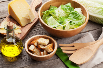Fresh healthy caesar salad cooking