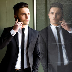 Man talks on mobile phone