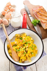 scrambled eggs with fat smoked bacon and parsley