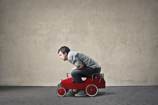 Man In A Toy Car