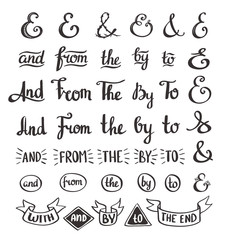 Fototapeta na wymiar collection of hand sketched ampersands and catchwords made in vector. Handsketched set of design elements. Calligraphic detailes.