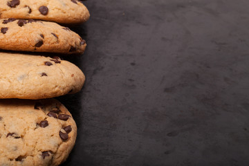 American cookies with chocolate drops on a black background