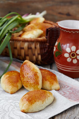 Fresh baked pasties filled with egg and green onion