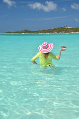 Fototapeta na wymiar Girl on the beach of Exuma, Bahamas