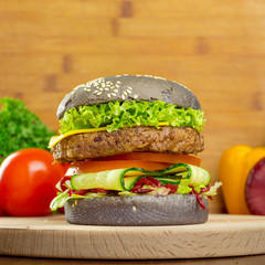 burgers on wooden background