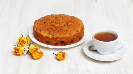 Pear cake with chocolate and cherries