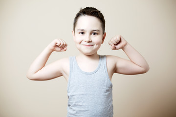 kid flexing biceps