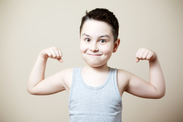 kid flexing biceps
