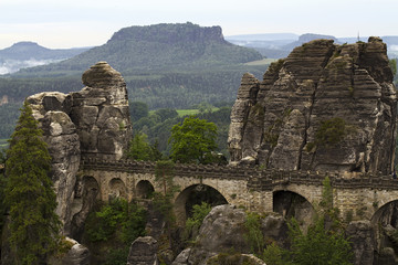 Landscape with rock massif and bridge