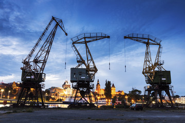 Old cranes in Szczecin - obrazy, fototapety, plakaty