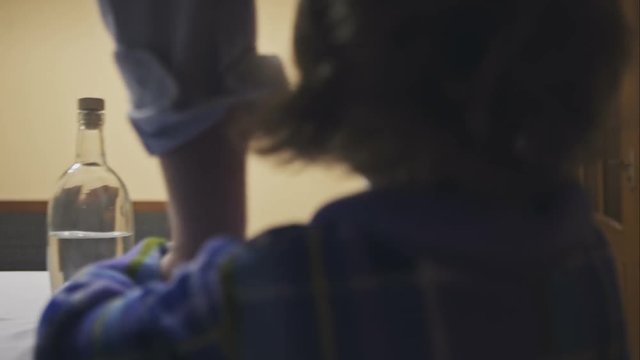 little girl with her mother and sister met an alcoholic father home. RAW video record.