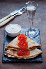 Blini with red caviar  and Vodka