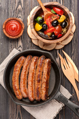 Grilled sausages, and vegetables salad