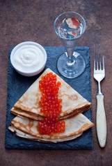 Blini with red caviar  and Vodka