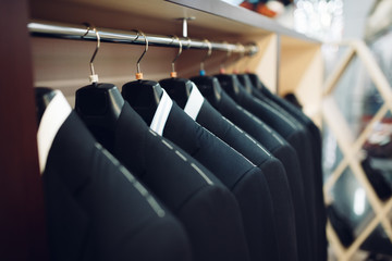 Rows of men's suit jackets