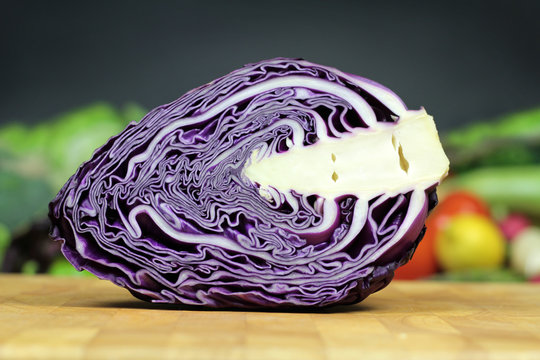 Red cabbage on chopping board 