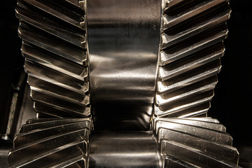 Metal gears. Part of the gear wheel of the engine.