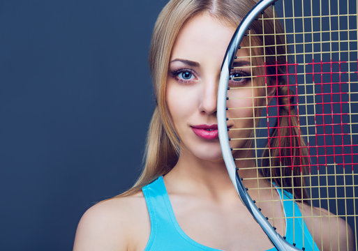 woman with a tennis racket