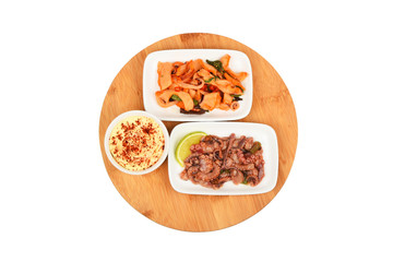 Two seafood salads on wooden board