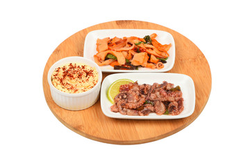 Two seafood salads on wooden board