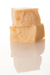 Parmesan cheese isolated over white background