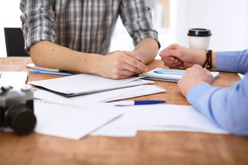 Business people meeting around table