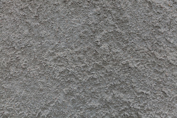 gray stone wall background with a distinctive structure