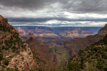 AZ-Grand Canyon National Park-S Rim-Bright Angel Trail. Spectacular cloud formations and scenery envelope the hiker!