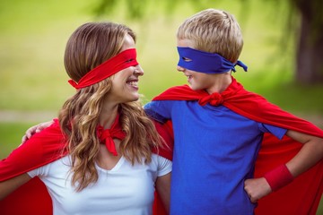 Mother and son pretending to be superhero © WavebreakMediaMicro