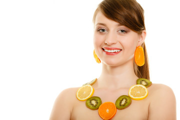 Diet. Girl with necklace of fresh citrus fruits isolated