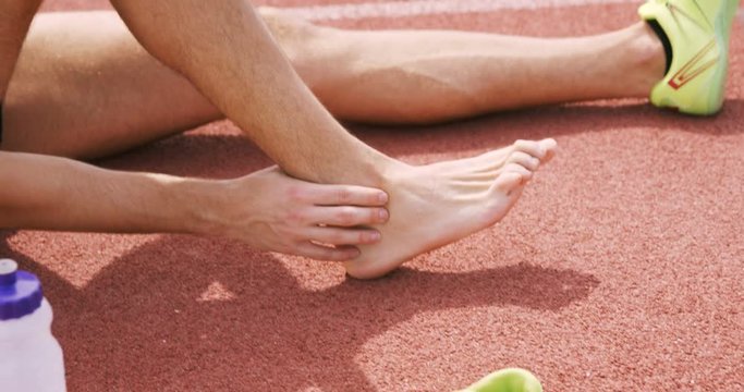 Sportsman hurting his foot