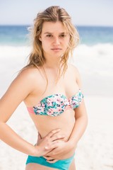 Portrait of beautiful woman in bikini on the beach