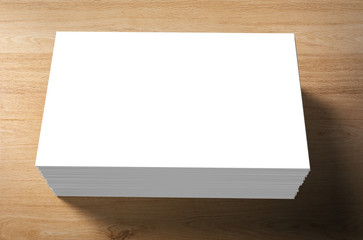 stack of white blank name card on wooden background
